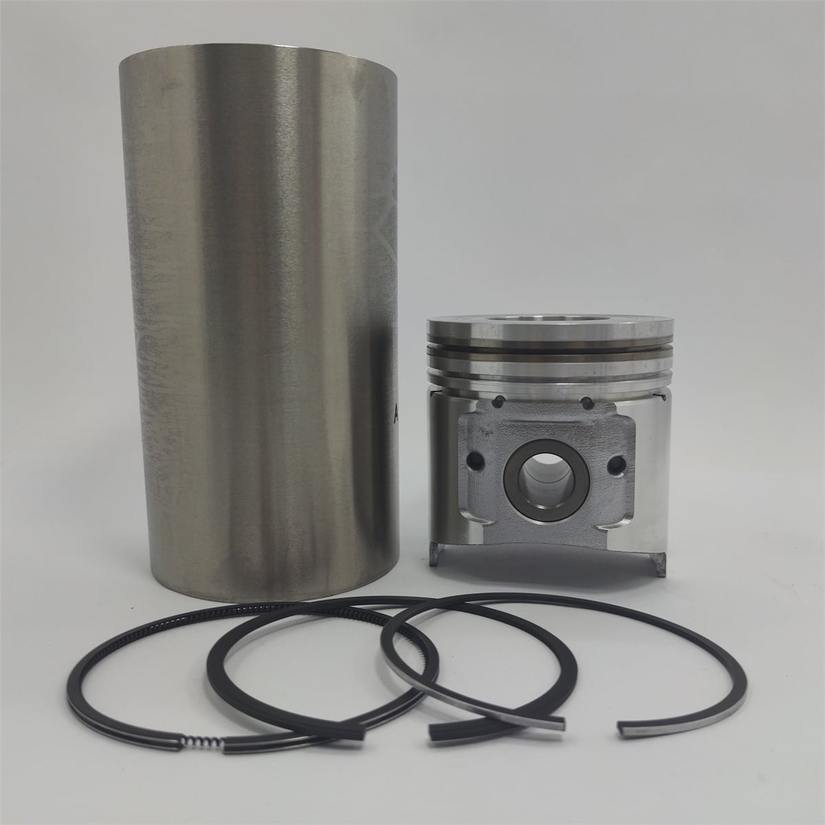 Kit (Piston (Tip scurt) + Set segmenti + Camasa cilindru - Semifinisare - Diametru :94,00 mm): YANMAR / 4TNE94 / 4TNV94