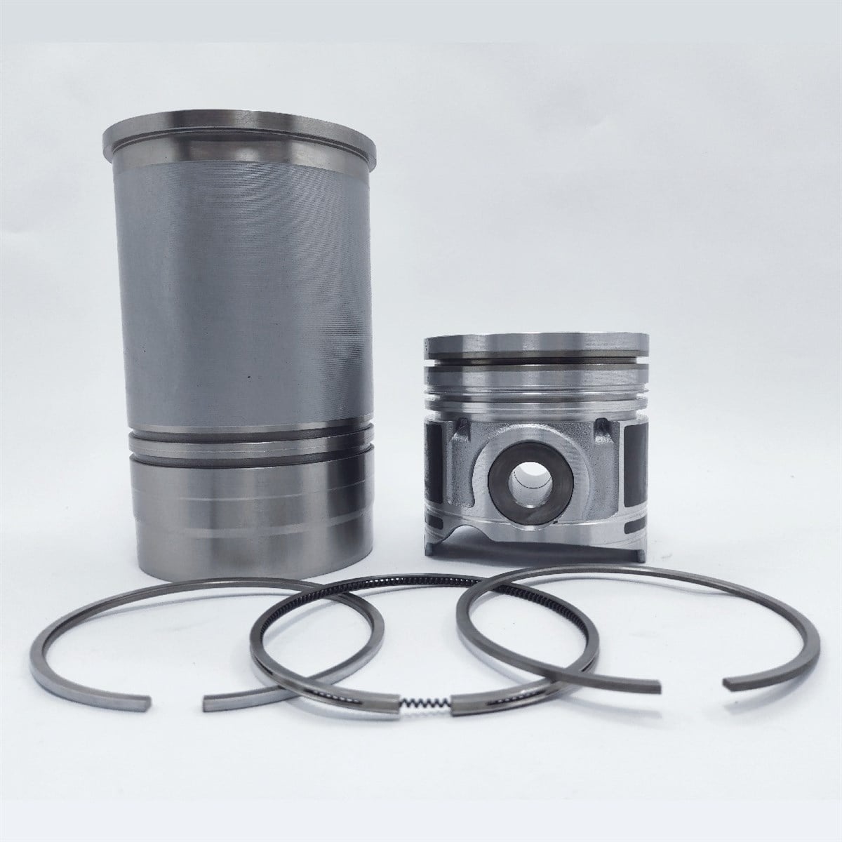 Kit (Set piston si segmenti + Camasa cilindru - 105.00 mm): SAME / LAMBORGHINI / 1000.6 ATI / 1000.6 WTI / 1000.6 WTIR / 1000.6 WTIS / Nr. referinta: 0.0634.0: 0.00.6