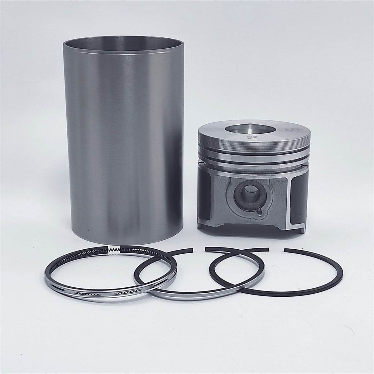 Kit (Piston + Set segmenti + Camasa cilindru - SEMIFINISH - Diametru: 87,00 mm): KUBOTA / V2203-DI / V2403-DI